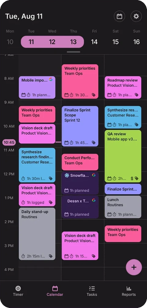 A phone in front showing the mobile calendar in dark mode, a week of colour-coded time blocks